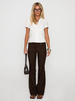 side view of model wearing Princess Polly What A Show Button Up Top White Short Sleeves V-Neck 