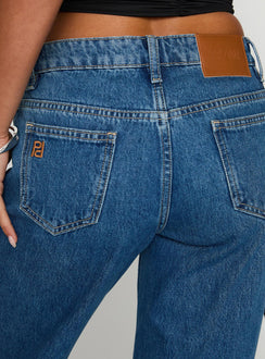back view of model wearing Princess Polly On Sunset Mid Rise Straight Leg Jeans Dark Wash Mid Rise 