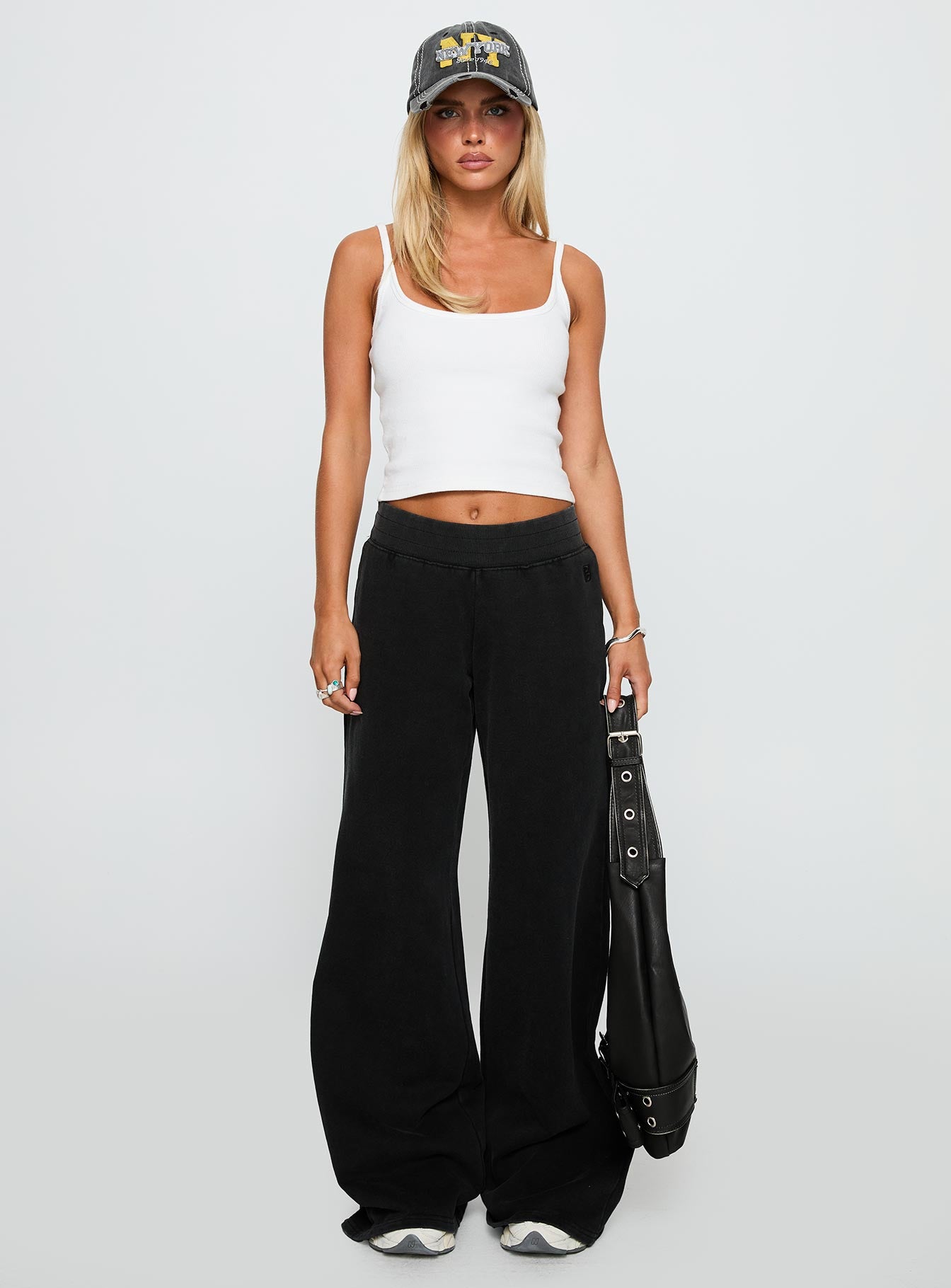 front view of model wearing Princess Polly Summits Flared Track Pants Washed Black High Waisted Pants 