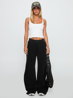 front view of model wearing Princess Polly Summits Flared Track Pants Washed Black High Waisted Pants 
