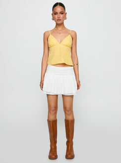 front view of model wearing Princess Polly Honey Honey Top Lemon Sleeveless Plunger 