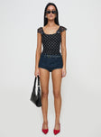 front view of model wearing Princess Polly Beckinsale Polka Top Black Short Sleeves Scoop Neck 