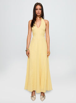 side view of model wearing Princess Polly Summer State Halter Maxi Dress Yellow Plunger 