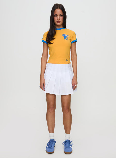 front view of model wearing Princess Polly UCLA Goalie Baby Tee Yellow Short Sleeves Crew Neck 
