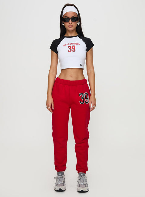 front view of model wearing Princess Polly BU Sweatpants Red High Waisted Pants 