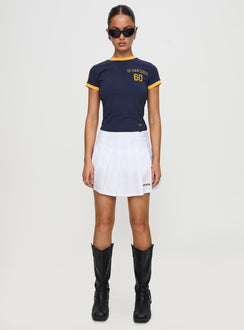   front view of model wearing Princess Polly UCSD Tennis Skort White 