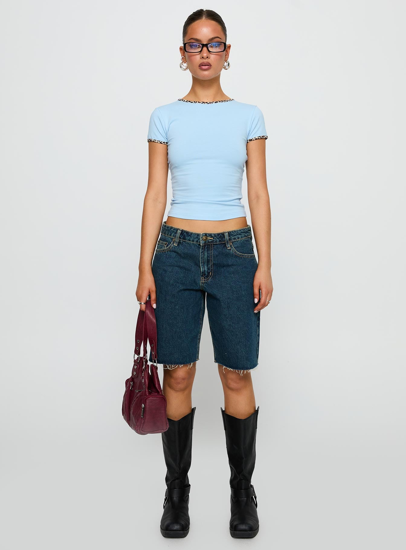 front view of model wearing Princess Polly Torissa Top Blue Short Sleeves Crew Neck 