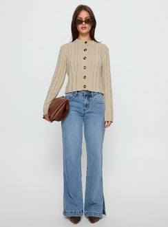 side view of model wearing Princess Polly Donielle Cable Knit Cardigan Beige cropped 
