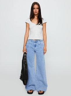 front view of model wearing Princess Polly Reaper Baggy Denim Jeans Light Blue Wash Mid Rise 