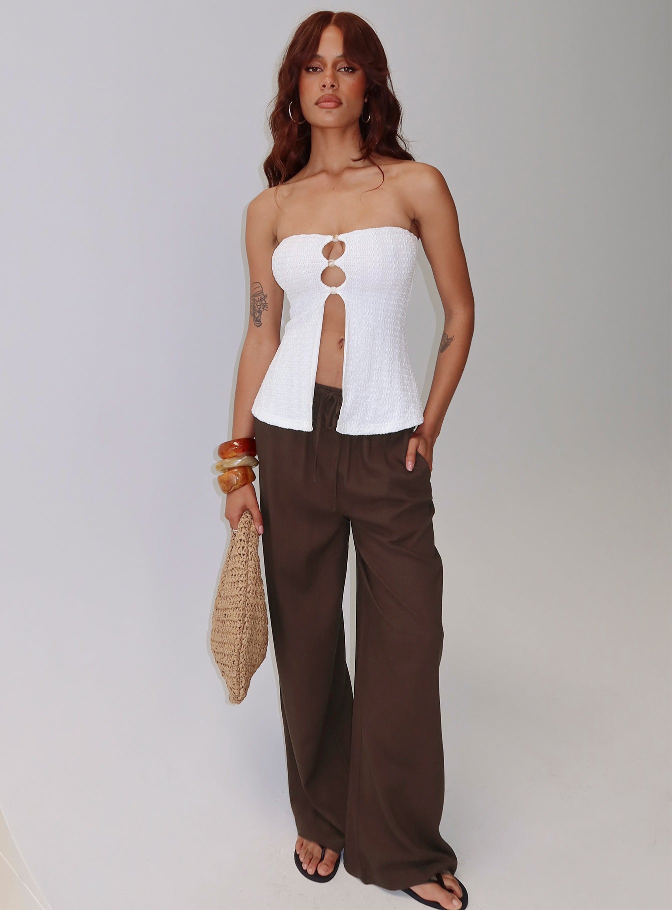 front view of model wearing Princess Polly Parklea Pants Chocolate Brown High Rise Pants 