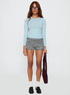 front view of model wearing Princess Polly Baby Cupid Long Sleeve Graphic Top Washed Blue Full Sleeves Crew Neck 