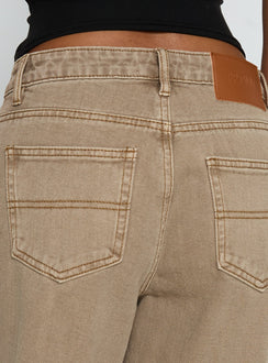 side view of model wearing Princess Polly Naylor Mid Rise Wide Leg Jeans Light Brown Wash Mid Rise Jeans Jeans 