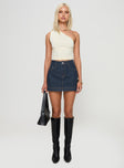 front view of model wearing Princess Polly Heuston Denim Skort Dark Wash Lower Impact High Waisted Shorts 