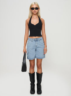 side view of model wearing Princess Polly Mika Carpenter Denim Shorts Light Wash High Waisted Shorts 