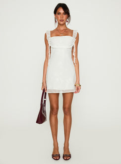 side view of model wearing Princess Polly Lanai Mini Dress White Floral Square Neck 