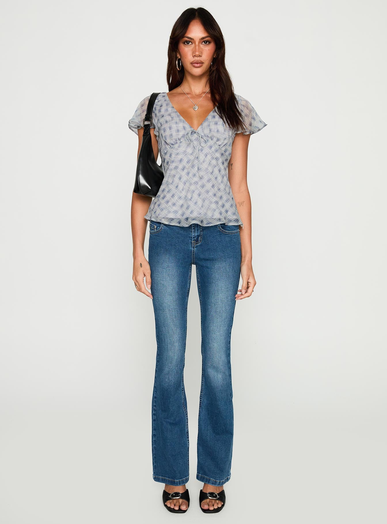 front view of model wearing Princess Polly My Last Love Top Blue Check Short Sleeves Plunger 