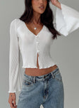Cream Long sleeve top Plisse material, v neckline, flared sleeves, button fastening at front, split hem