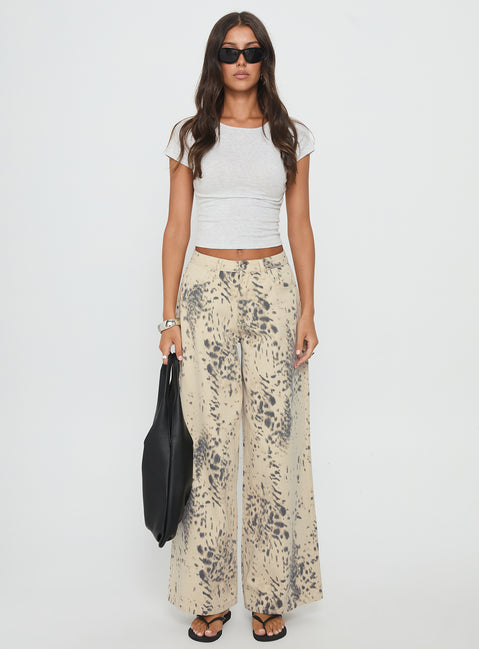 front view of model wearing Princess Polly Naylor Mid Rise Wide Leg Jeans Animal Spot Mid Rise Jeans 