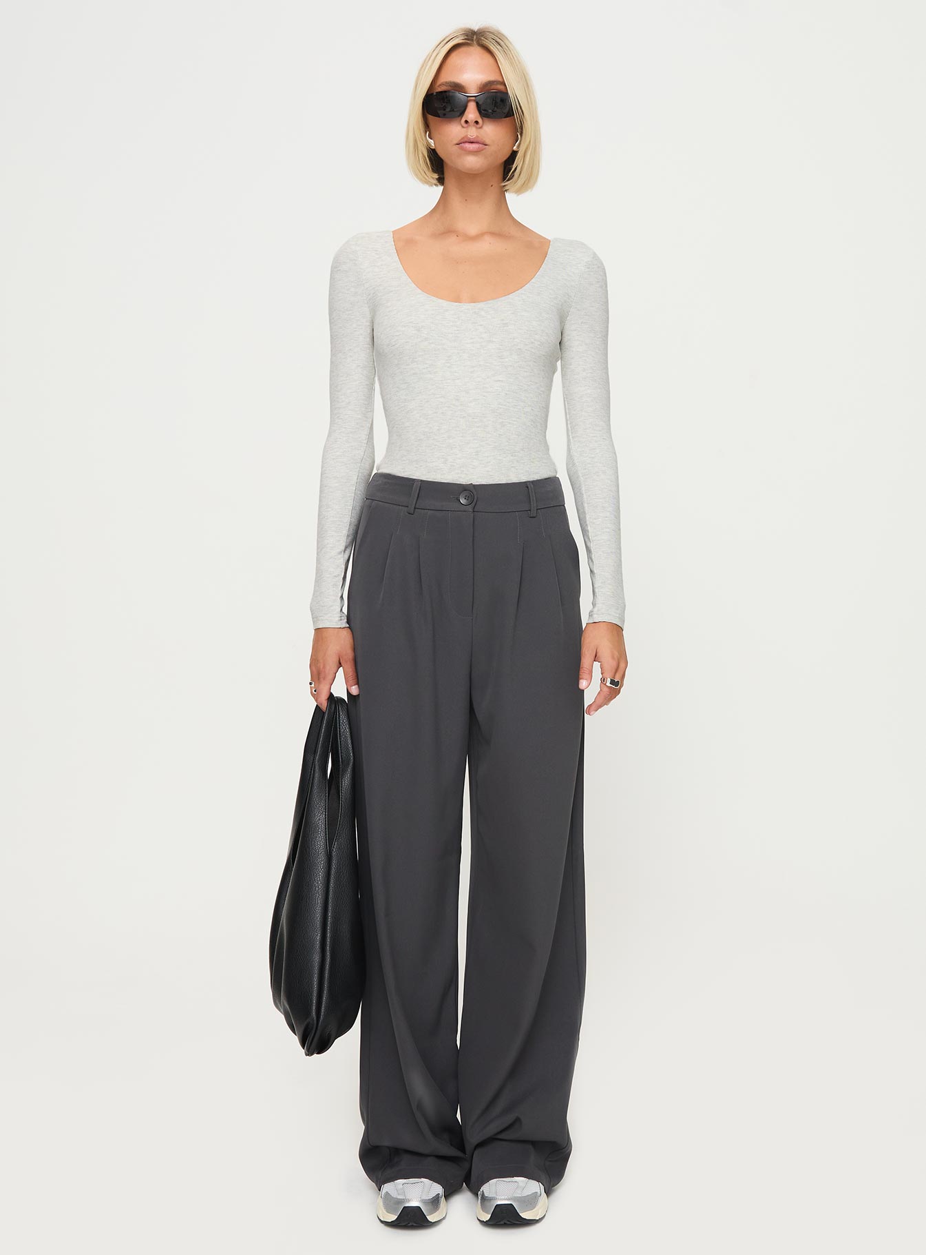 side view of model wearing Princess Polly Greener Long Sleeve Bodysuit Grey Full Sleeves Crew Neck 