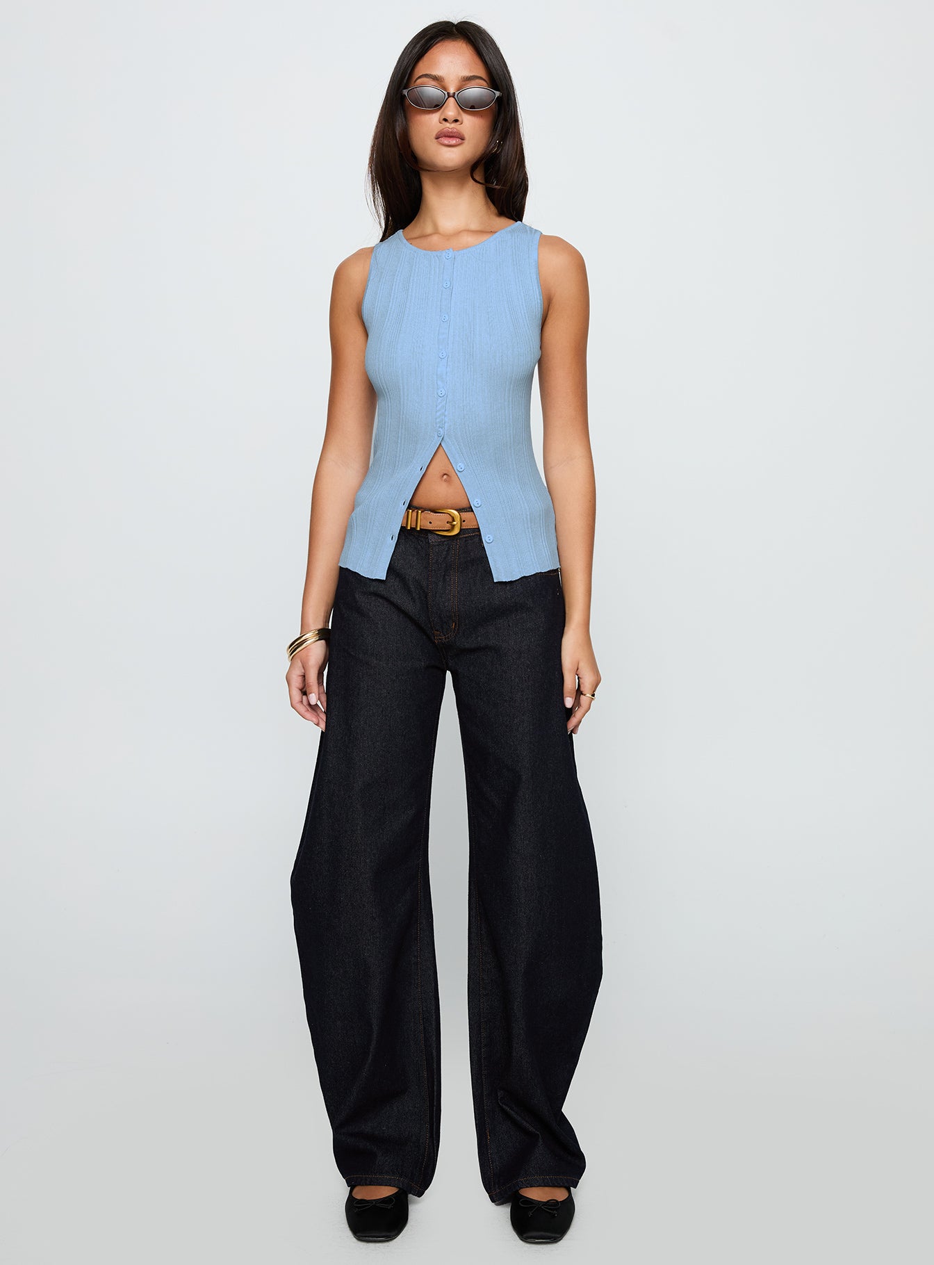 front view of model wearing Princess Polly Oregano Top Blue Sleeveless Crew Neck 