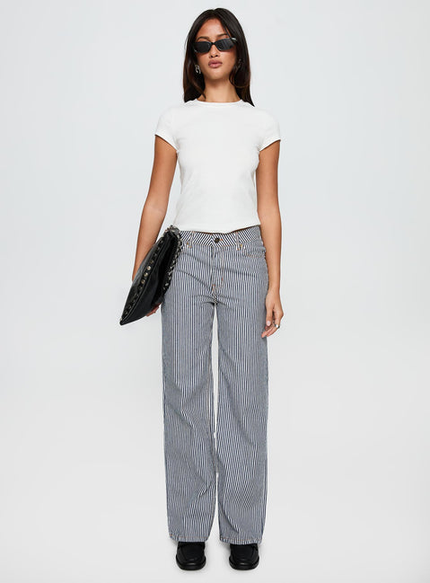 front view of model wearing Princess Polly Top Model Jean Navy Stripe Low Rise Pants 