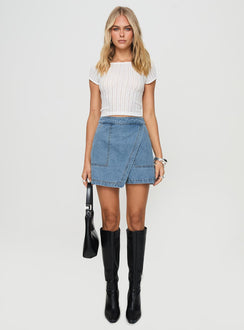 front view of model wearing Princess Polly Bentiez Denim Skort Mid Wash High Waisted Shorts 