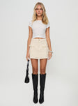 front view of model wearing Princess Polly Cadern Skort Cream High Waisted Shorts 