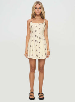 side view of model wearing Princess Polly Elian Linen Blend Mini Dress Cream / Multi Square Neck 