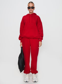 front view of model wearing Princess Polly Dream Fleece Ankle Cuff Sweatpants Red High Waisted Pants 
