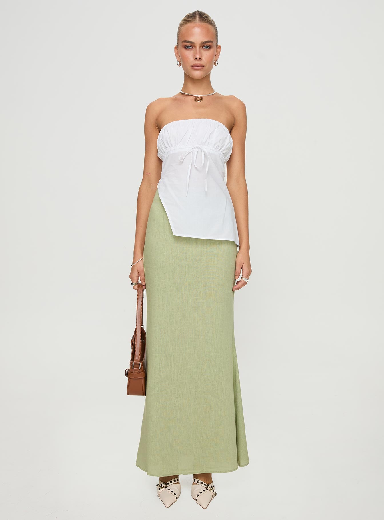 side view of model wearing Princess Polly Kiji Strapless Top White Sleeveless straight 