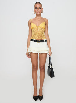 front view of model wearing Princess Polly Manski Lace Top Yellow Sleeveless Plunger 