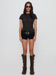 front view of model wearing Princess Polly Romelle Shirred Top Black / Brown Plaid Short Sleeves High Neck 