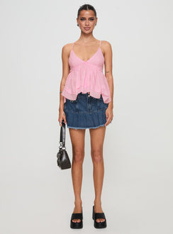 side view of model wearing Princess Polly Zephyra Top Pink Sleeveless Plunger 