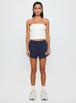 front view of model wearing Princess Polly Columbia Soffee Shorts Navy 