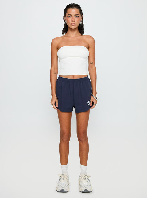 front view of model wearing Princess Polly Columbia Soffee Shorts Navy 