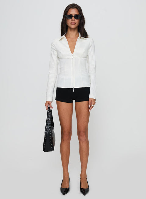 front view of model wearing Princess Polly Bellar Long Sleeve Top Ivory Full Sleeves V-Neck 