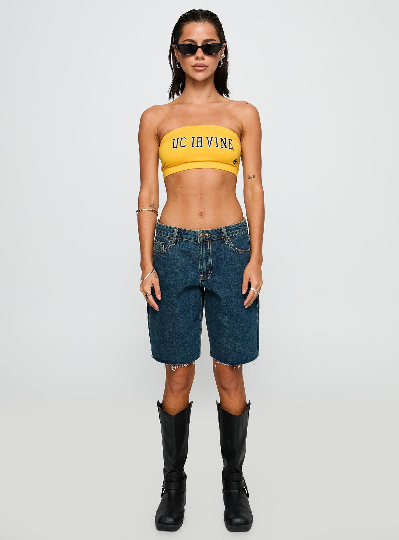 side view of model wearing Princess Polly UC Irvine Bandeau Top Gold Sleeveless straight 