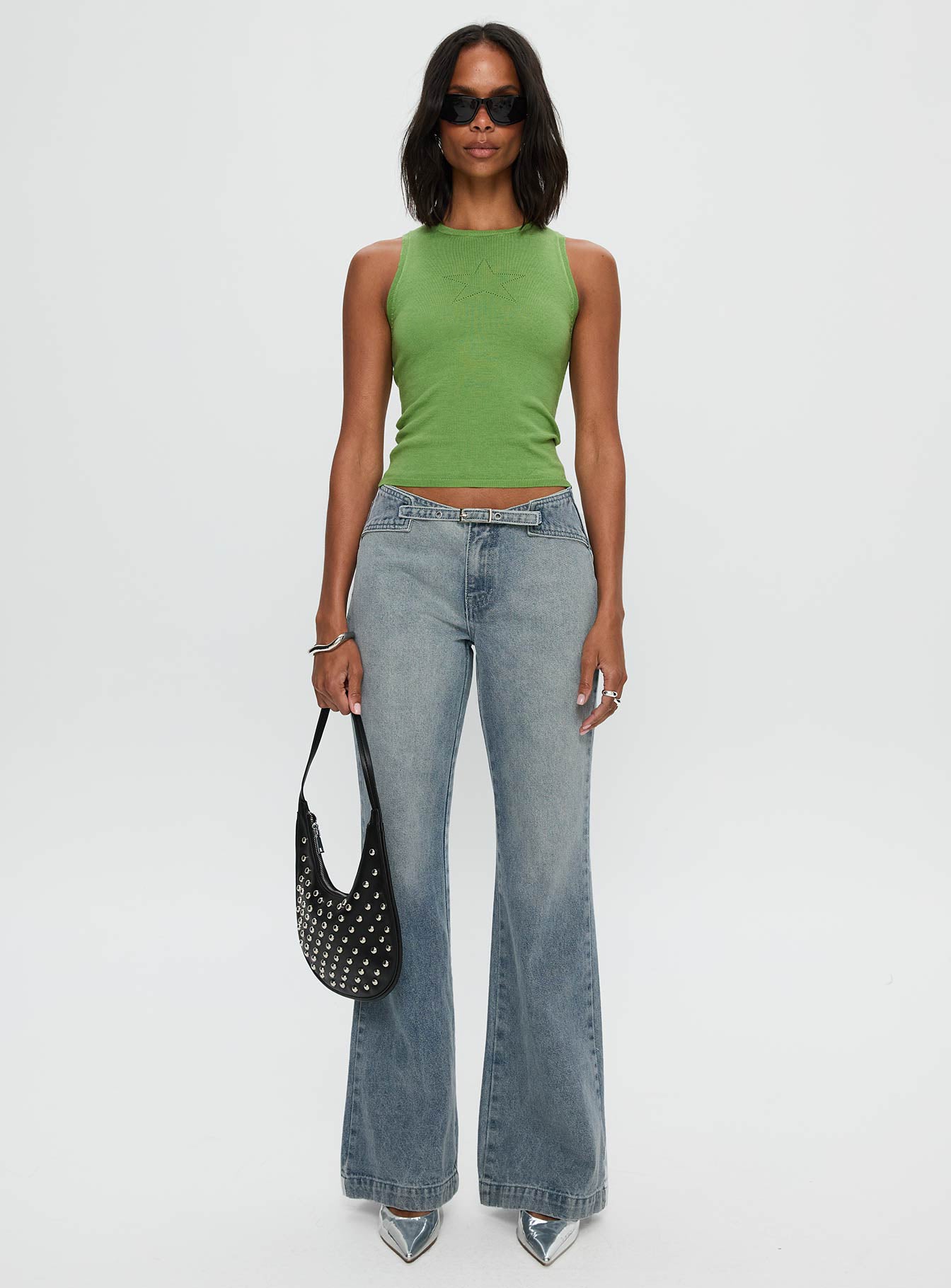 side view of model wearing Princess Polly Girl Almighty Top Green Sleeveless Crew Neck 