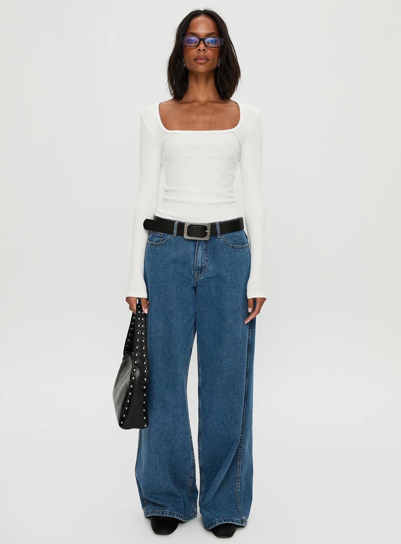 front view of model wearing Princess Polly Baseline Rib Long Sleeve Top White Full Sleeves Scoop Neck 