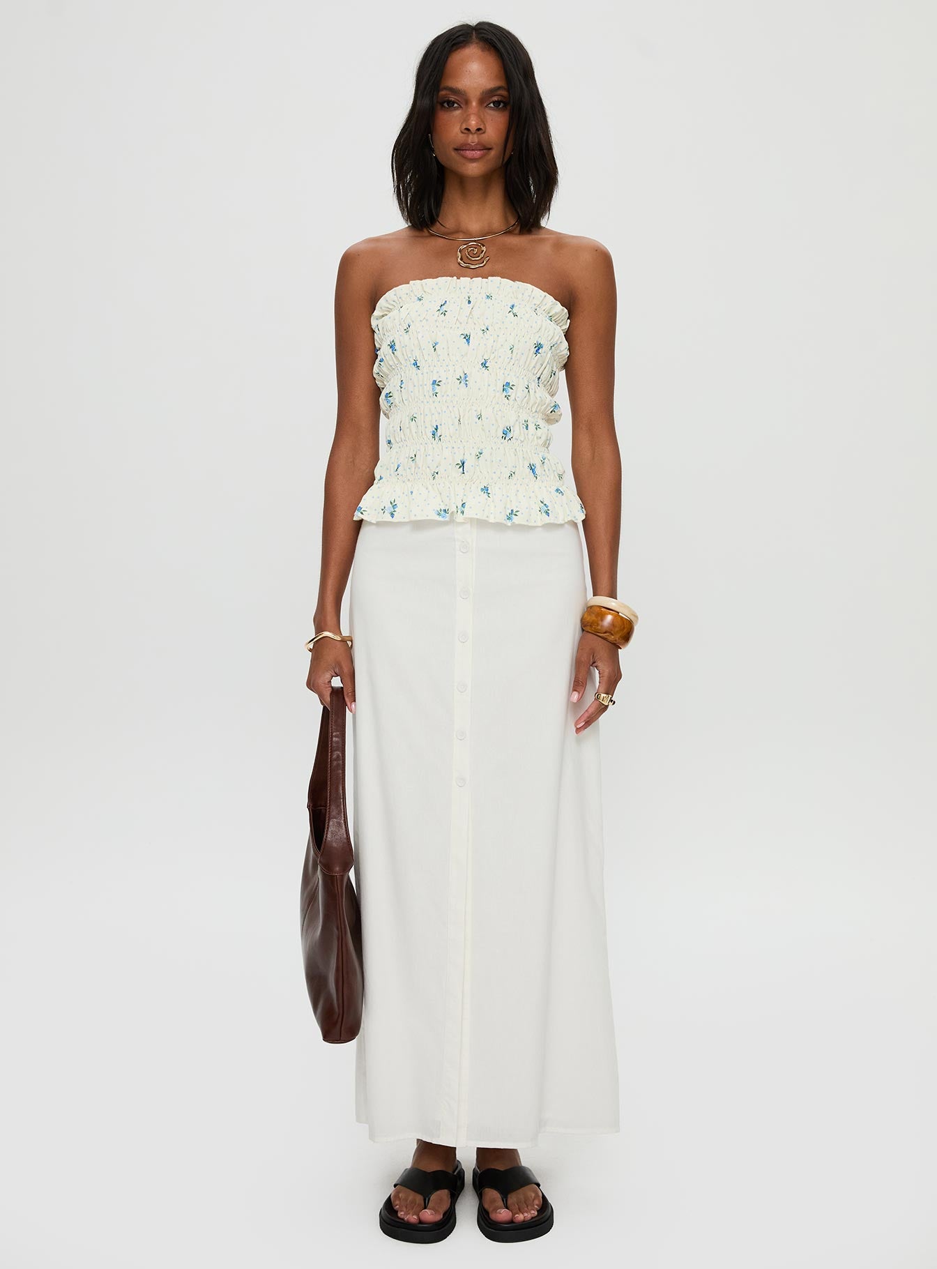   side view of model wearing Princess Polly Jasmira Maxi Skirt White Maxi 