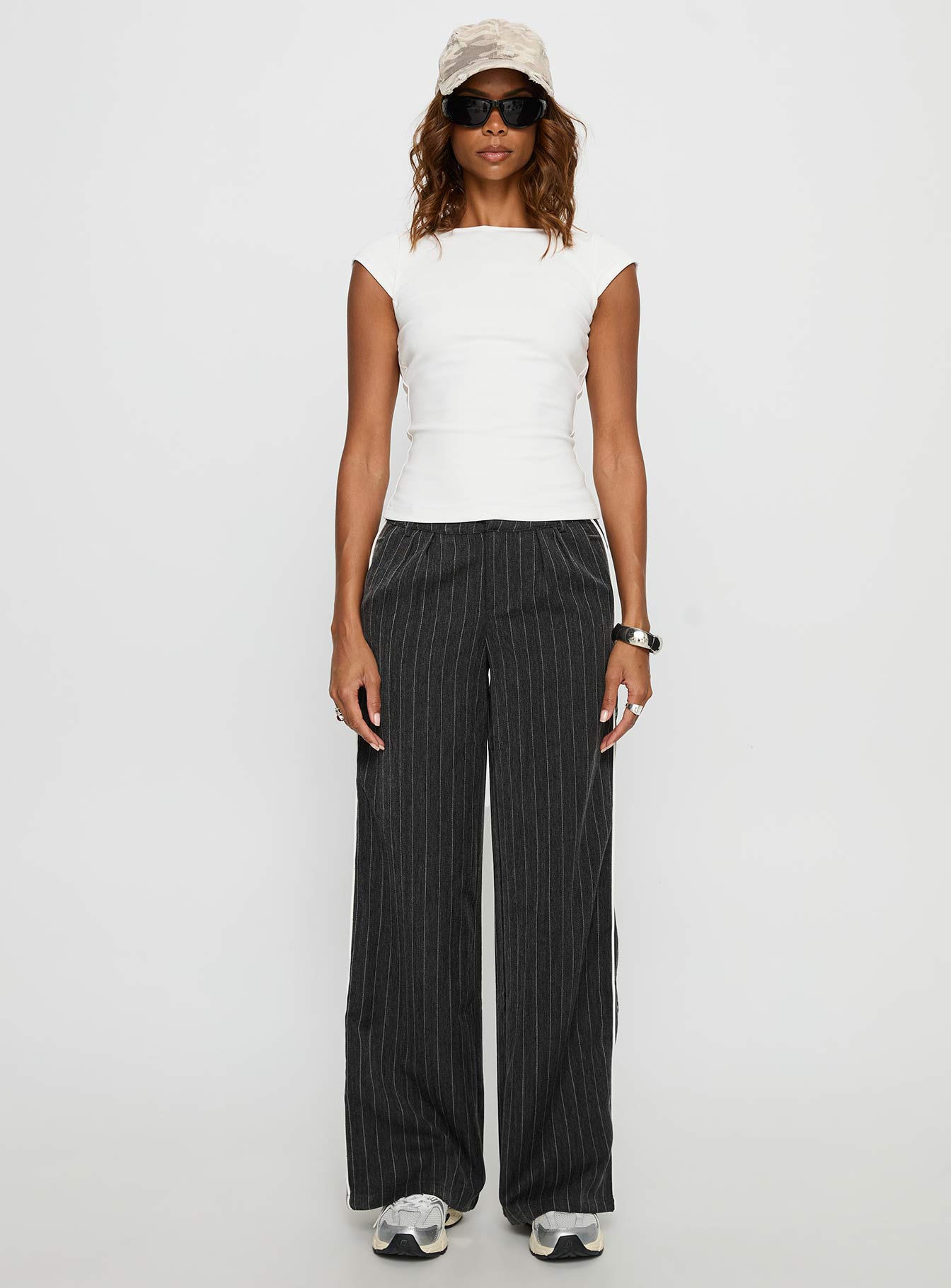 front view of model wearing Princess Polly Knowla Pleated Trouser Pant Grey Pinstripe Mid Rise Pants 