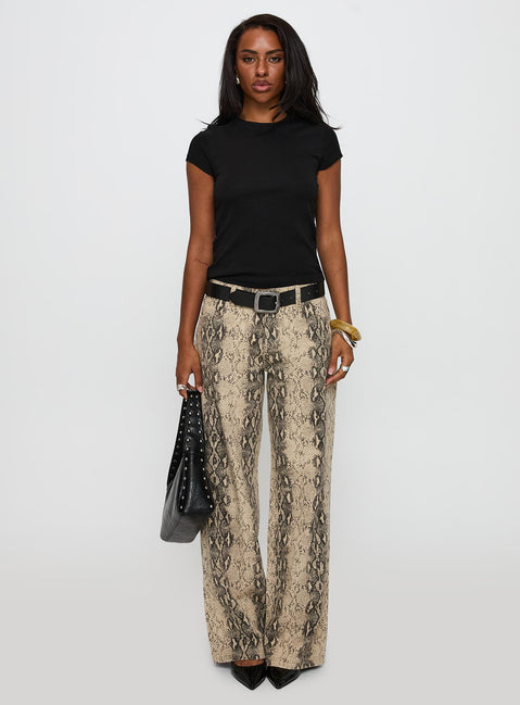 side view of model wearing Princess Polly Prestige Longline Baby Tee Black Short Sleeves High Neck 