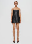 front view of model wearing Princess Polly Isak Woven Faux Leather Mini Dress Black Square Neck 