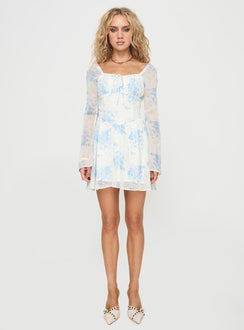 front view of model wearing Princess Polly Robertstone Long Sleeve Mini Dress White / Blue Floral Square Neck 