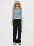 Long sleeve top Knit material, crew neckline, open back, adjustable straps at back Non-stretch material, unlined, sheer