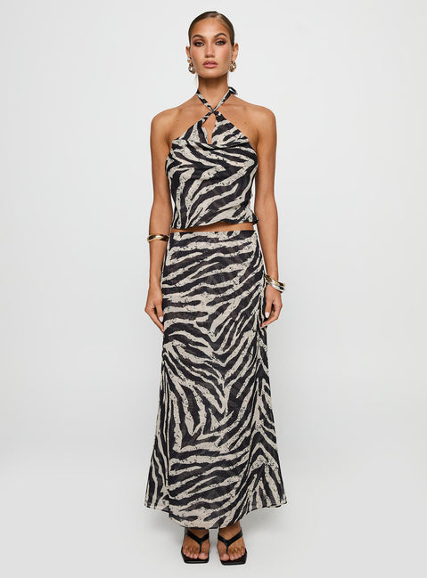   side view of model wearing Princess Polly Eleganza Maxi Skirt Zebra Maxi 