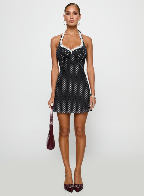 front view of model wearing Princess Polly Black Beauty Halter Mini Dress Black / Polka Plunger 