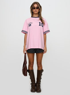 side view of model wearing Princess Polly Cornwall Football Jersey Pink Half Sleeves Crew Neck 