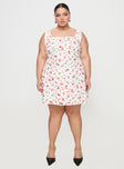 side view of model wearing Princess Polly Dasha Mini Dress White Floral Curve Square Neck 