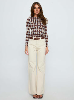 front view of model wearing Princess Polly Maple Mid Rise Flare Jeans Ecru High Rise Jeans 